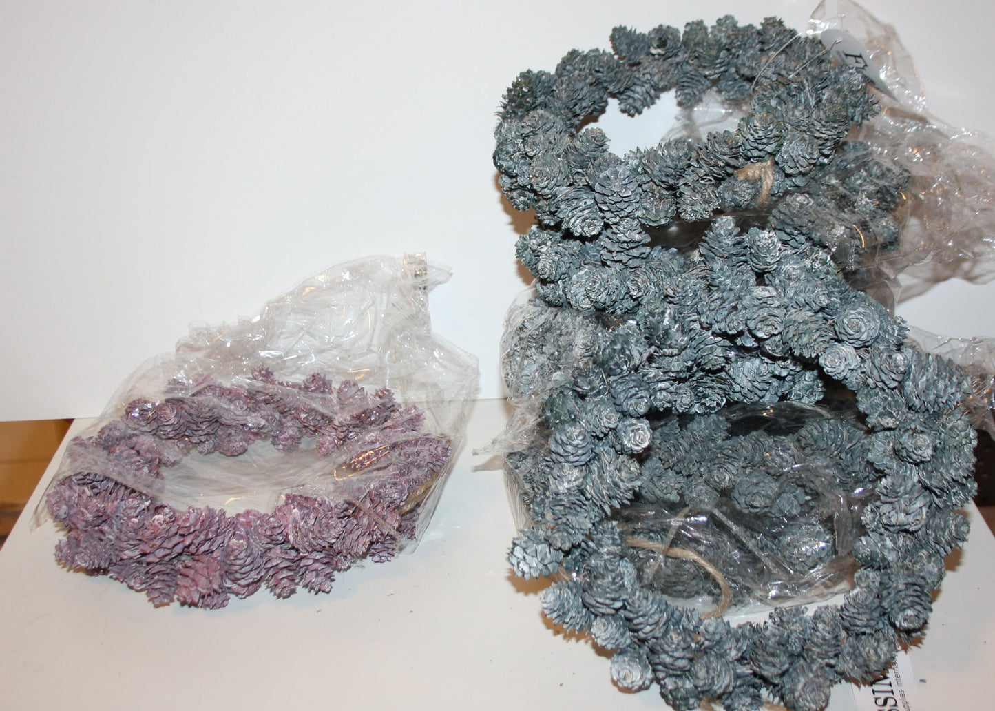 #8069 Zapfenkraenze in Rosa und türkis/ petrol