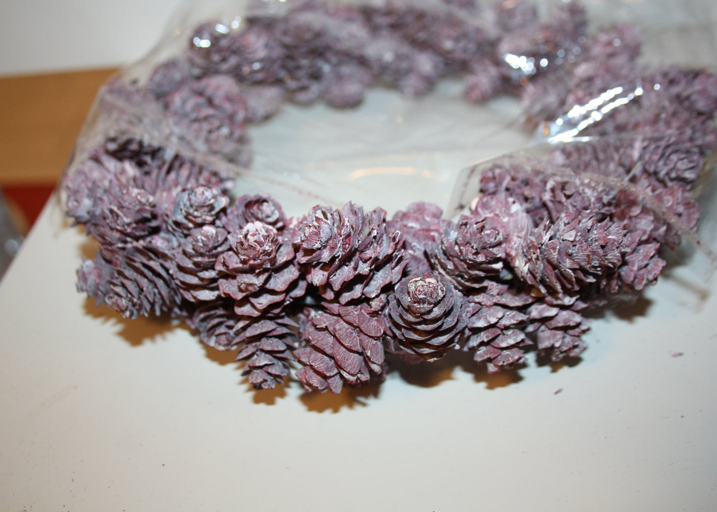 #8069 Zapfenkraenze in Rosa und türkis/ petrol